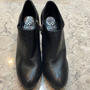 Vince Camuto. Size 8.5. Black ankle booties with silver zippers. 4 inch heel.